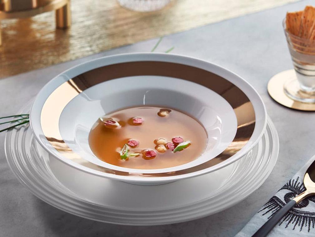 Consommé met calvados
